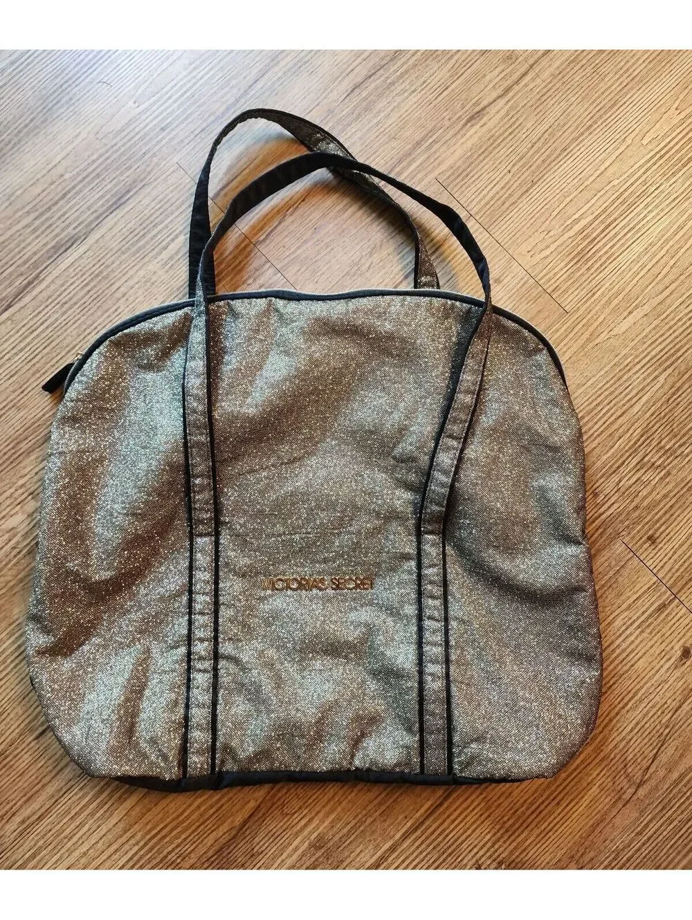 Victoria's Secret Gold Glitter Tote Bag with Black Accents and Dual Handles